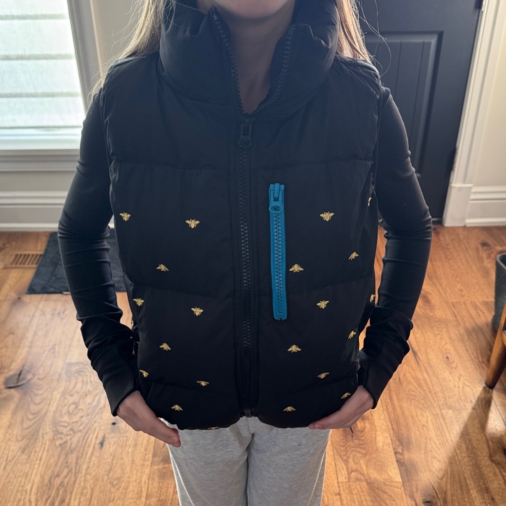 Black Puffer Vest with Gold Accents